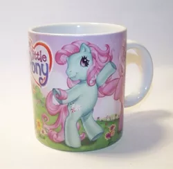 Size: 1311x1277 | Tagged: safe, derpibooru import, minty, pinkie pie (g3), earth pony, pony, bipedal, female, g3, irl, mare, merchandise, mug, my little pony logo, photo, rearing