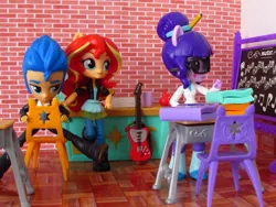 Size: 1480x1110 | Tagged: safe, artist:whatthehell!?, derpibooru import, flash sentry, sci-twi, sunset shimmer, twilight sparkle, equestria girls, apple, book, boots, chair, chalkboard, classroom, clothes, desk, doll, equestria girls minis, eqventures of the minis, female, flashimmer, flashlight, food, guitar, irl, jacket, male, musical instrument, pair, pants, photo, school, shipping, shoes, straight, toy, triangle, tuxedo
