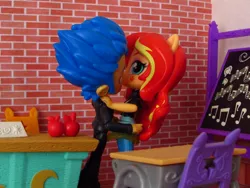 Size: 1400x1050 | Tagged: safe, artist:whatthehell!?, derpibooru import, flash sentry, sunset shimmer, equestria girls, apple, boots, chair, classroom, clothes, desk, doll, equestria girls minis, female, flashimmer, food, guitar, irl, jacket, kissing, male, musical instrument, pair, pants, photo, school, shipping, shoes, straight, toy, tuxedo
