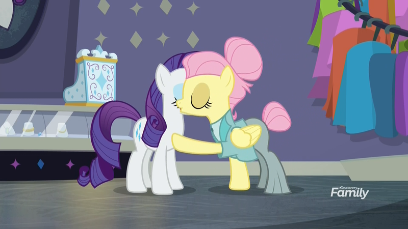 Size: 1920x1080 | Tagged: safe, derpibooru import, screencap, fluttershy, rarity, pegasus, pony, unicorn, fake it 'til you make it, air kiss, alternate hairstyle, clothes, discovery family logo, duo, eyes closed, female, hair bun, kiss on the cheek, kissing, la bise, mare, platonic kiss, raised hoof, rarity for you, severeshy