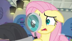 Size: 1366x768 | Tagged: safe, derpibooru import, screencap, fluttershy, pony, fake it 'til you make it, magnifying glass, solo