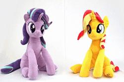 Size: 400x266 | Tagged: safe, artist:nekokevin, derpibooru import, starlight glimmer, sunset shimmer, twilight sparkle, twilight sparkle (alicorn), alicorn, pony, unicorn, series:nekokevin's glimmy, 4de, animated, clothes, cute, female, gif, glimmerbetes, holding a pony, irl, looking down, mare, nekokevin is trying to murder us, photo, plushie, shimmerbetes, sitting, smiling, socks, starlight's little twibird, striped socks
