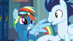 Size: 1920x1080 | Tagged: safe, derpibooru import, screencap, rainbow dash, soarin', pegasus, pony, grannies gone wild, clothes, duo, female, goggles, grin, locker room, male, mare, smiling, spread wings, stallion, uniform, wings, wonderbolts uniform