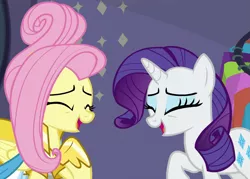 Size: 1507x1079 | Tagged: safe, derpibooru import, screencap, fluttershy, rarity, pegasus, pony, unicorn, fake it 'til you make it, cropped, duo, eyes closed, laughing, warrior of inner strength, warriorshy