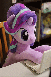 Size: 200x300 | Tagged: safe, alternate version, artist:nekokevin, derpibooru import, starlight glimmer, pony, unicorn, series:nekokevin's glimmy, animated, chair, computer, cute, desk, female, gif, glimmerbetes, irl, laptop computer, life size, mare, photo, plushie, smiling, solo, stop motion, typing