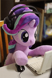 Size: 200x300 | Tagged: safe, alternate version, artist:nekokevin, derpibooru import, starlight glimmer, pony, unicorn, series:nekokevin's glimmy, animated, chair, computer, computer mouse, cute, female, gif, glimmerbetes, headphones, irl, laptop computer, looking down, mare, multicolored mane, photo, plushie, shaking, smiling, solo, stop motion