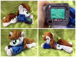 Size: 1600x1200 | Tagged: safe, artist:equinepalette, derpibooru import, oc, oc:littlepip, unofficial characters only, pony, unicorn, fallout equestria, fanfic, beanie (plushie), clothes, cutie mark, female, hand, hooves, horn, irl, mare, photo, pipbuck, plushie, prone, solo, vault suit