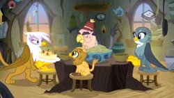 Size: 1200x675 | Tagged: safe, derpibooru import, screencap, gabby, gilda, grampa gruff, grizzle, gryphon, the hearth's warming club, blind eye, boomerang (tv channel), chickub, eye scar, family, female, griffon scone, male, scar, table, window