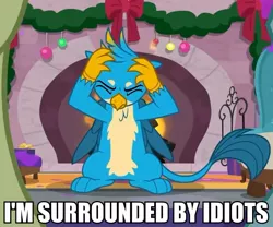 Size: 648x540 | Tagged: safe, derpibooru import, screencap, gallus, gryphon, the hearth's warming club, caption, claws, cropped, eyes closed, fire, fireplace, image macro, i'm surrounded by idiots, male, meme, paws, solo focus, tail, text, upset, wings