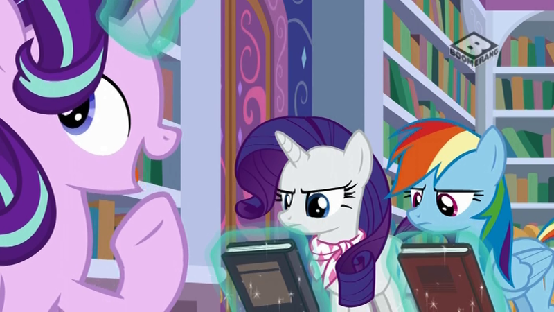 Size: 1024x576 | Tagged: safe, derpibooru import, screencap, rainbow dash, rarity, starlight glimmer, pegasus, pony, unicorn, the end in friend, book, boomerang (tv channel), female, magic, mare, open mouth, telekinesis, trio