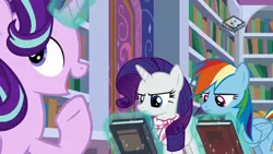 Size: 1024x576 | Tagged: safe, derpibooru import, screencap, rainbow dash, rarity, starlight glimmer, pegasus, pony, unicorn, the end in friend, book, boomerang (tv channel), female, magic, mare, open mouth, telekinesis, trio