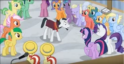 Size: 854x440 | Tagged: safe, derpibooru import, screencap, chancellor neighsay, dusty swift, fast break, fat stacks, fiery fricket, flam, flim, frying pan (character), high roller, lightning riff, rarity, saturn (character), silver waves, sweet buzz, twilight sparkle, twilight sparkle (alicorn), wintergreen, alicorn, earth pony, pegasus, pony, unicorn, friendship university, background pony, boomerang (tv channel), crowd, female, flim flam brothers, frying pan, las pegasus resident, male, mare, microphone, stallion