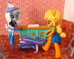 Size: 602x480 | Tagged: safe, artist:whatthehell!?, derpibooru import, applejack, starlight glimmer, trixie, eqg summertime shorts, equestria girls, abuse, animated, boots, bully, bullying, classroom, clothes, desk, doll, downvote bait, equestria girls minis, glimmerbuse, hat, irl, kicking, photo, school, shoes, skirt, stop motion, toy
