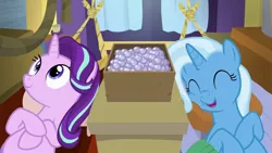 Size: 1280x720 | Tagged: safe, derpibooru import, screencap, starlight glimmer, trixie, pony, unicorn, road to friendship, duo, duo female, female, hammock, mare, on back, smiling, trixie's wagon, wagon