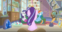 Size: 1067x549 | Tagged: safe, derpibooru import, screencap, rainbow dash, rarity, starlight glimmer, pegasus, pony, unicorn, the end in friend, animation error, book, bookshelf, boomerang (tv channel), boots, cabinet, clothes, couch, door, female, geode, glitter boots, inkwell, mare, neckerchief, picture frame, quill, shoes, starlight's office, trio