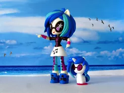 Size: 1600x1200 | Tagged: safe, artist:whatthehell!?, derpibooru import, vinyl scratch, pony, unicorn, equestria girls, beach, clothes, cutie mark crew, doll, equestria girls minis, glasses, gulls, human ponidox, irl, leggings, merchandise, ocean, photo, self ponidox, shoes, skirt, sneakers, sunglasses, toy