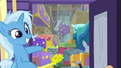 Size: 1280x720 | Tagged: safe, derpibooru import, screencap, trixie, pony, unicorn, road to friendship, cannon, clutter, female, grin, mare, messy mane, smiling, solo, trixie's wagon