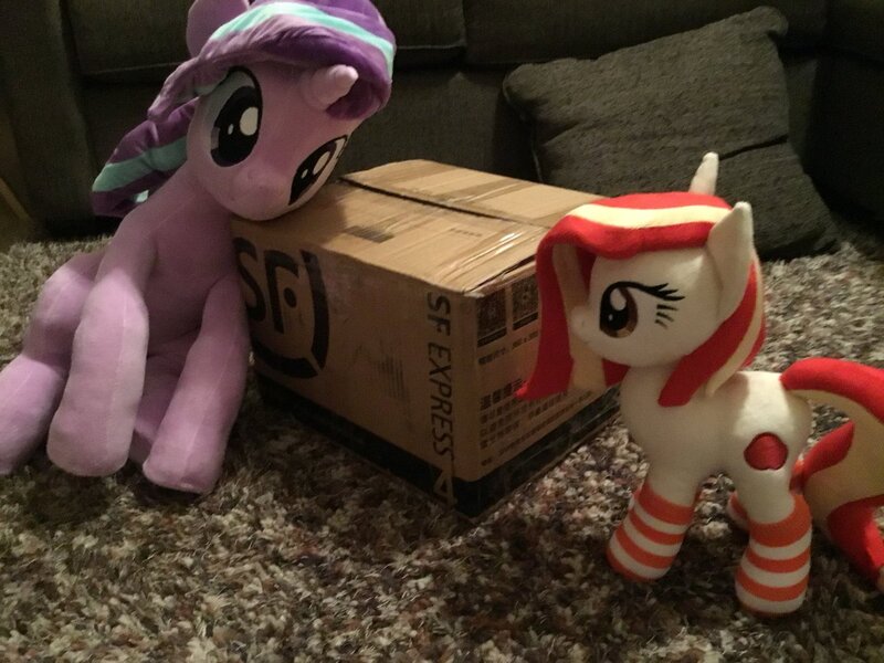 Size: 1200x900 | Tagged: safe, artist:nekokevin, derpibooru import, starlight glimmer, oc, oc:poniko, earth pony, pony, unicorn, series:nekokevin's glimmy, box, clothes, duo, female, irl, mare, photo, pillow, plushie, sitting, size difference, smiling, socks, striped socks