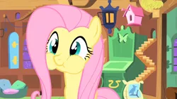 Size: 1280x720 | Tagged: safe, derpibooru import, screencap, fluttershy, pegasus, pony, stare master, :t, bird house, cute, female, fluttershy's cottage, fluttershy's cottage (interior), holding breath, lantern, mare, puffy cheeks, shyabetes