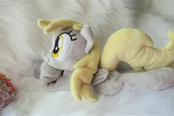 Size: 5472x3648 | Tagged: safe, artist:kazzysart, derpibooru import, derpy hooves, pegasus, pony, beanie (plushie), female, folded wings, irl, mare, photo, plushie, prone, solo, wings