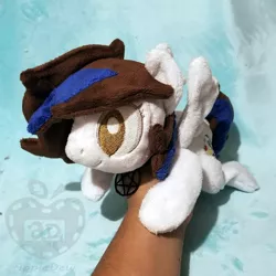 Size: 1000x1000 | Tagged: safe, artist:appledew, derpibooru import, oc, oc:rose bell, unofficial characters only, pegasus, pony, beanie (plushie), female, hand, irl, jewelry, mare, necklace, photo, plushie, prone, solo, wings