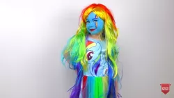 Size: 1280x720 | Tagged: child, clothes, cosplay, costume, derpibooru import, human, irl, irl human, living nightmare, makeup, nightmare fuel, photo, rainbow dash, safe, this is why we can't have nice things, uncanny valley, wat