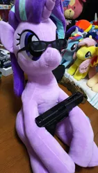 Size: 675x1200 | Tagged: safe, artist:nekokevin, derpibooru import, fluttershy, rainbow dash, starlight glimmer, pegasus, pony, unicorn, series:nekokevin's glimmy, airsoft, female, glock 18, gun, handgun, holding, irl, mare, photo, pistol, plushie, size difference, smiling, sunglasses, weapon