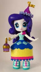 Size: 1022x1800 | Tagged: safe, artist:whatthehell!?, derpibooru import, rarity, equestria girls, bracelet, carousel dress, clothes, doll, equestria girls minis, hat, irl, jewelry, lamp, lantern, merchandise, photo, skirt, theme park, toy