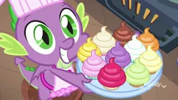 Size: 1920x1080 | Tagged: safe, derpibooru import, screencap, spike, dragon, father knows beast, apron, baby, baby dragon, baking, chef's hat, clothes, cupcake, cute, discovery family, discovery family logo, folded wings, food, green eyes, grin, gullible, hat, kitchen, logo, male, naked apron, oven, platter, smiling, solo, spikabetes, teeth, twilight's castle, watermark, winged spike, wings