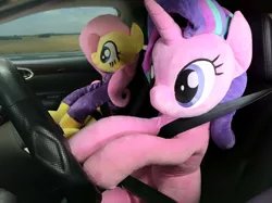 Size: 5488x4112 | Tagged: safe, alternate version, artist:nekokevin, derpibooru import, fluttershy, starlight glimmer, pegasus, pony, unicorn, series:nekokevin's glimmy, absurd resolution, car, clothes, cute, driving, duo, female, glimmerbetes, irl, life size, mare, photo, plushie, seatbelt, shyabetes, sitting, smiling, solo, steering wheel, sweater, sweatershy, this will not end well