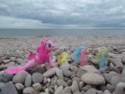 Size: 1280x960 | Tagged: safe, artist:travelling-my-little-pony, derpibooru import, pinkie pie, seaspray (g1), wavedancer, pony, sea pony, beach, behind you, following, g1, g4, image, irl, jpeg, pebble, photo, ponies in real life, sea ponies, surfdancer, toy