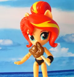 Size: 1620x1685 | Tagged: safe, artist:whatthehell!?, derpibooru import, sunset shimmer, equestria girls, beach, candy, clothes, doll, equestria girls minis, food, irl, lollipop, merchandise, photo, ponied up, swimsuit, toy