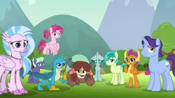 Size: 1280x720 | Tagged: safe, derpibooru import, screencap, bifröst, gallus, night view, november rain, ocellus, sandbar, silverstream, smolder, yona, changedling, changeling, classical hippogriff, dragon, earth pony, gryphon, hippogriff, pegasus, pony, unicorn, yak, school raze, bow, cloven hooves, colored hooves, dragoness, female, flying, friendship student, hair bow, jewelry, looking at you, male, mare, monkey swings, necklace, stallion, student six, teenager