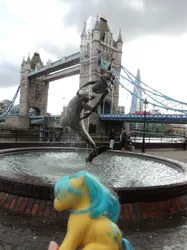 Size: 1280x1707 | Tagged: artist:david wynne, artist:travelling-my-little-pony, bridge, bubbles (g1), bus, craft, derpibooru import, dolphin, double decker bus, fountain, girl with a dolphin, human, irl, london, nudity, photo, sculpture, suggestive, the shard, tower bridge, water