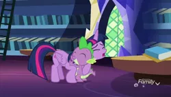 Size: 1920x1080 | Tagged: safe, derpibooru import, screencap, spike, twilight sparkle, twilight sparkle (alicorn), alicorn, dragon, pony, father knows beast, book, bookshelf, hug, ladder, library, twilight's castle, twilight's castle library, winged spike