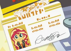 Size: 718x517 | Tagged: safe, derpibooru import, screencap, sunset shimmer, driving miss shimmer, equestria girls, equestria girls series, cropped, driver's license, geode of empathy, magical geodes, solo, written equestrian