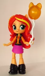 Size: 1339x2240 | Tagged: safe, artist:whatthehell!?, derpibooru import, sunset shimmer, equestria girls, equestria girls series, balloon, boots, clothes, cute, doll, equestria girls minis, globe, irl, photo, shoes, skirt, theme park, toy