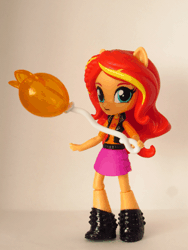 Size: 540x720 | Tagged: safe, artist:whatthehell!?, derpibooru import, sunset shimmer, equestria girls, equestria girls series, animated, boots, candy, clothes, doll, equestria girls minis, food, gif, globe, lollipop, loop, shoes, skirt, stop motion, theme park, toy