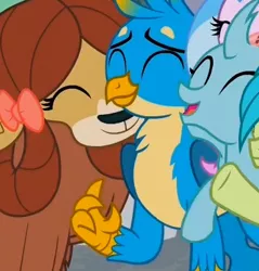 Size: 368x385 | Tagged: safe, derpibooru import, screencap, gallus, ocellus, sandbar, silverstream, yona, changedling, changeling, gryphon, yak, the hearth's warming club, cropped, cute, diaocelles, eyes closed, female, gallabetes, group hug, hug, male, offscreen character, smiling, yonadorable