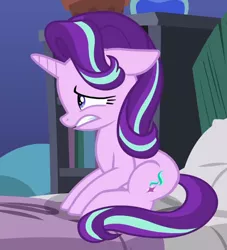 Size: 580x640 | Tagged: safe, derpibooru import, screencap, starlight glimmer, pony, unicorn, rock solid friendship, bed, bedroom, cropped, female, mare, sitting, solo, starlight's room