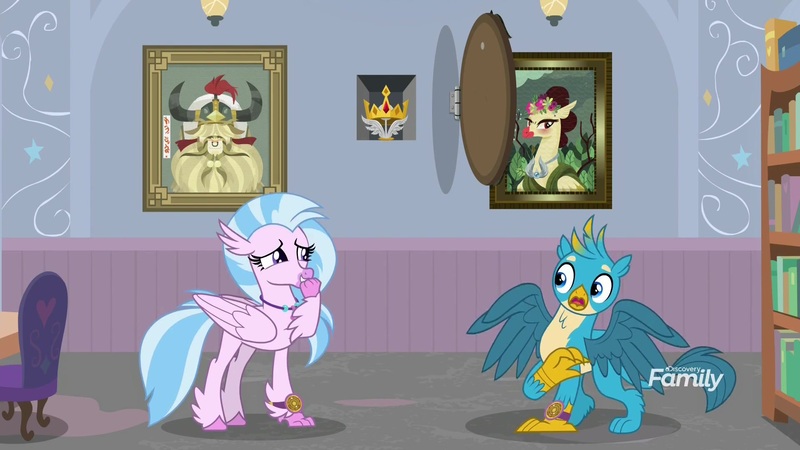 Size: 1920x1080 | Tagged: safe, derpibooru import, screencap, aurora (character), gallus, silverstream, yickslur, classical hippogriff, gryphon, hippogriff, a matter of principals, bookshelf, bust, chair, crown, crown of grover, discovery family logo, duo, female, jewelry, library, male, portrait, regalia