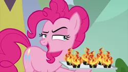 Size: 2880x1619 | Tagged: safe, derpibooru import, screencap, pinkie pie, earth pony, pony, the washouts (episode), cupcake, extreme chocolate airshow cupcake, female, food, grin, mare, narrowed eyes, raised eyebrow, smiling, solo