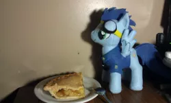 Size: 1024x613 | Tagged: artist:rycndel1337, clothes, derpibooru import, food, irl, photo, pie, plushie, safe, shirt, soarin', that pony sure does love pies, uniform, wonderbolts dress uniform