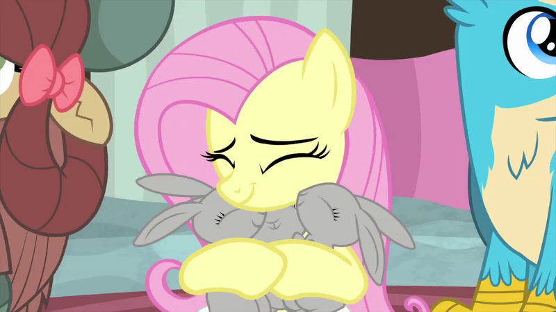 Size: 1280x720 | Tagged: safe, derpibooru import, screencap, fluttershy, gallus, yona, gryphon, pegasus, pony, rabbit, yak, teacher of the month (episode), spoiler:interseason shorts, animal, cute, hug, shyabetes