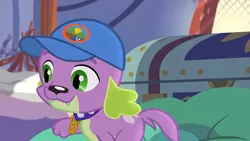 Size: 1280x720 | Tagged: safe, derpibooru import, screencap, spike, spike the regular dog, dog, equestria girls, legend of everfree, camp everfree logo, cap, collar, hat, paws, smiling, spike's dog collar, tail