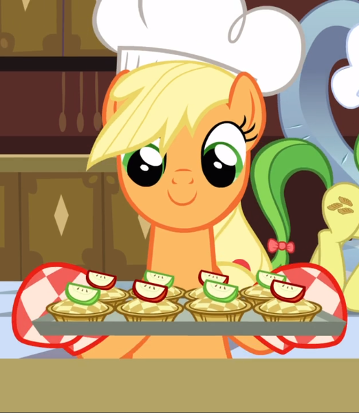 Size: 816x938 | Tagged: safe, derpibooru import, screencap, applejack, earth pony, pony, a canterlot wedding, apple fritter (food), baking sheet, chef's hat, cropped, cute, female, food, hat, jackabetes, mare, oven mitts, smiling, solo focus