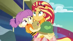 Size: 1920x1080 | Tagged: safe, derpibooru import, screencap, sunset shimmer, water lily (equestria girls), equestria girls, equestria girls series, spring breakdown, spoiler:eqg series (season 2), carrying, plushie, ponied up, super ponied up