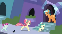 Size: 2100x1178 | Tagged: safe, derpibooru import, screencap, cherry valley, citrine nectar, coral shores, golden väs, ruby love, scarlet heart, crystal pony, earth pony, pony, the beginning of the end, background pony, crystal empire, family, female, filly, foal, house, male, mare, quartet, running, scared, stallion