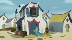 Size: 1280x720 | Tagged: safe, derpibooru import, screencap, gallus, gryphon, uprooted, barrel, discovery family logo, firewood, grampa gruff's house, griffonstone, hay, house, knocking, knocking on door, male, solo, spider web, wings