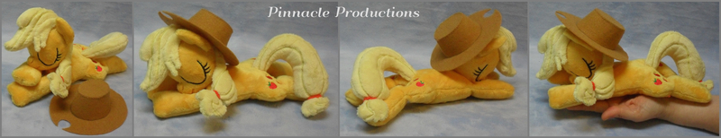 Size: 4239x816 | Tagged: safe, artist:bluedragonflyplush, derpibooru import, applejack, earth pony, pony, applejack's hat, beanie (plushie), cowboy hat, female, hand, hat, irl, mare, photo, plushie, prone, solo